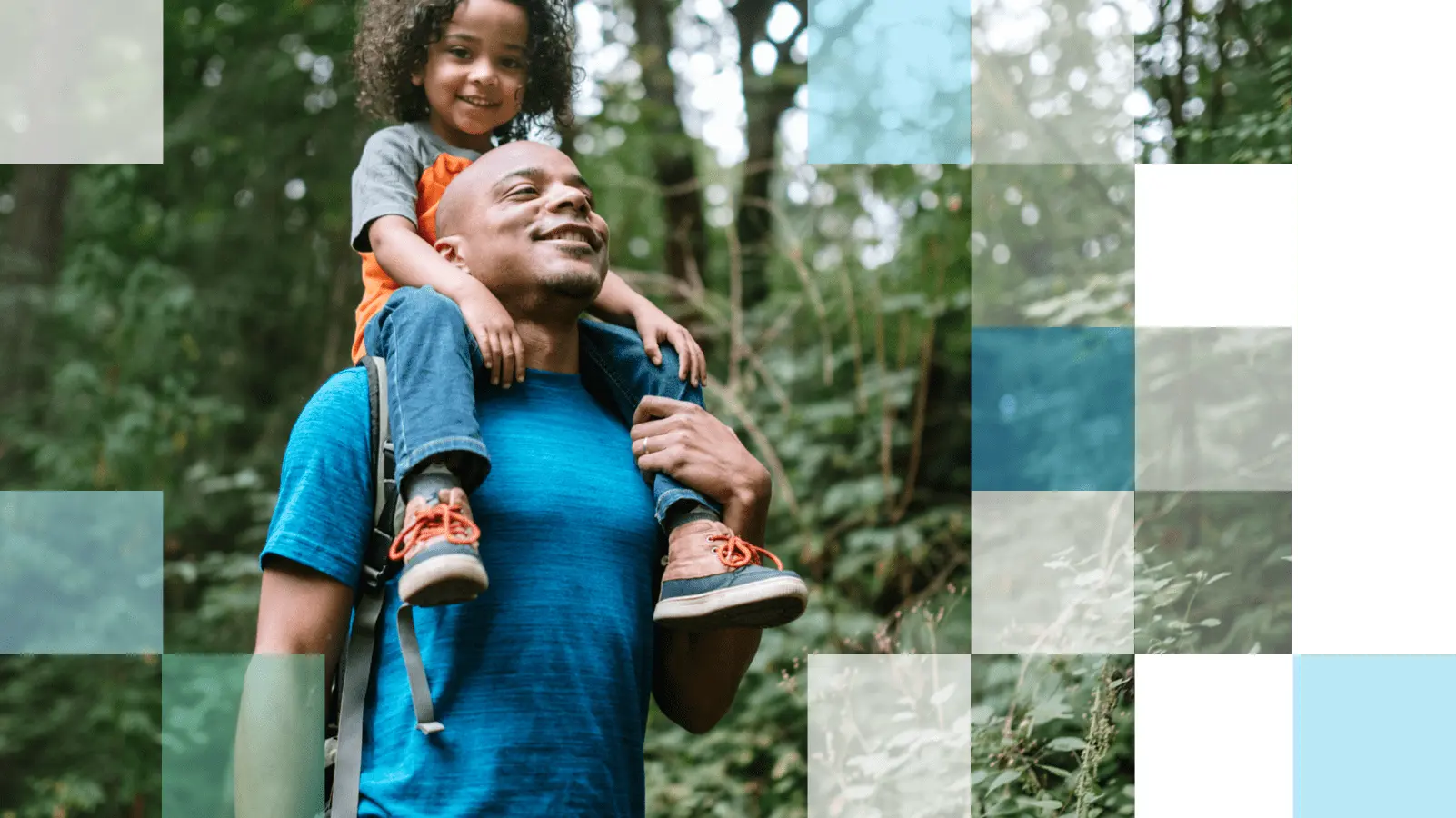 Parent and child in a lush green forest going on a hike